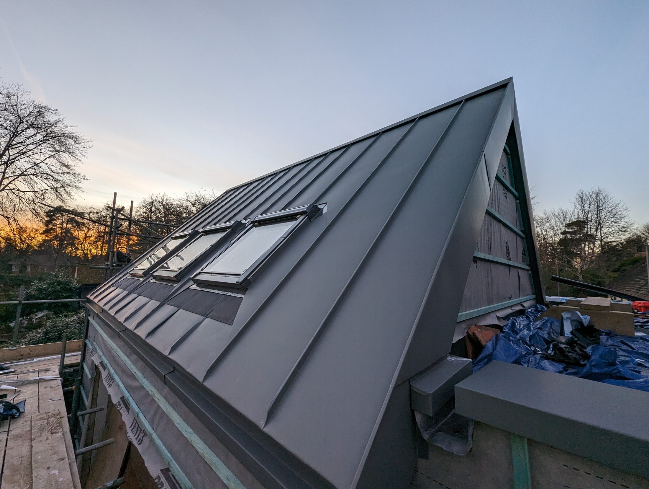 Close view of Copperclad zinc standing-seam roofing detail