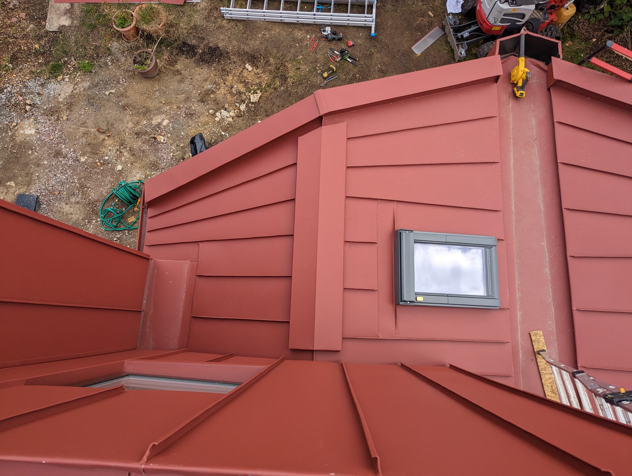 Red PREFA extension project photograph 6