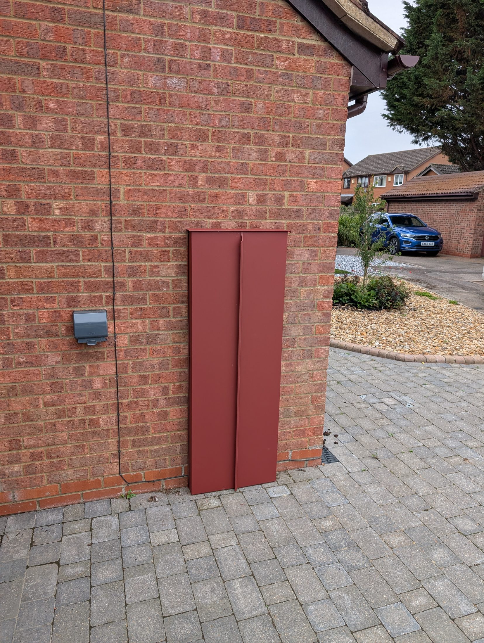 Red PREFA extension project photograph 15