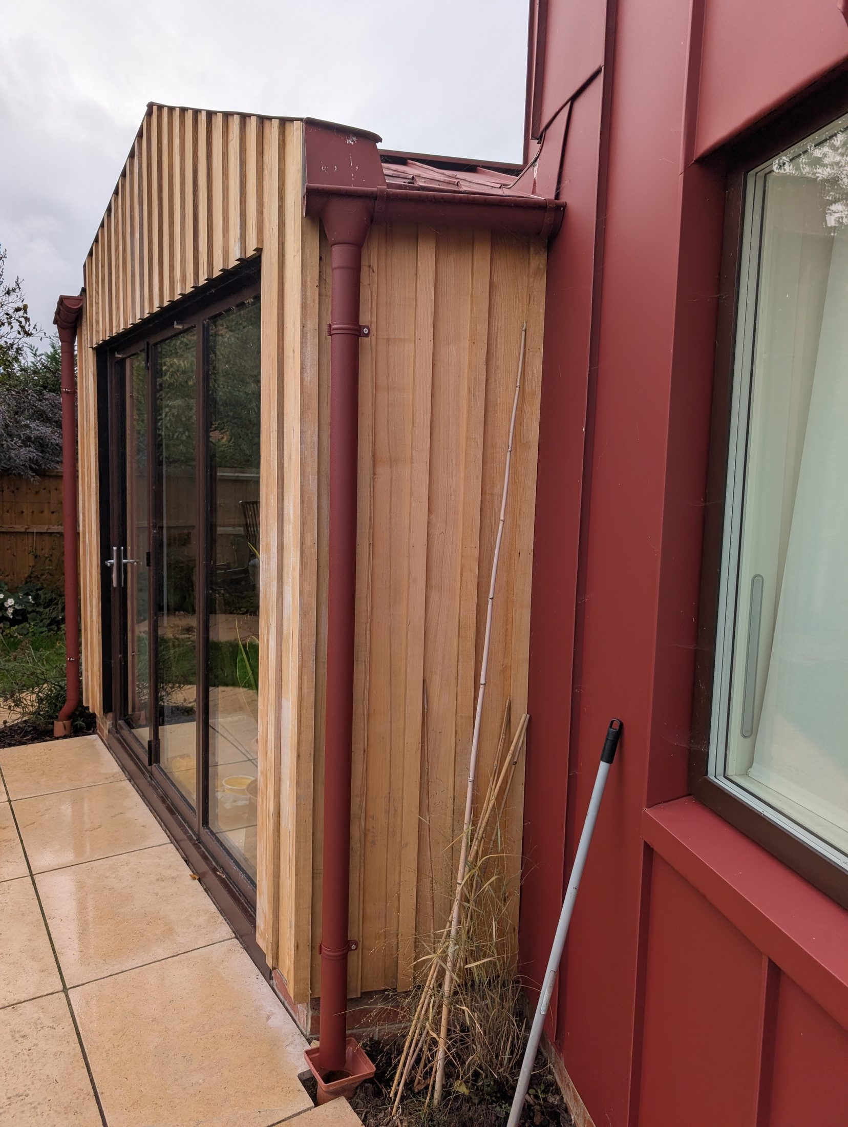 Red PREFA extension project photograph 16