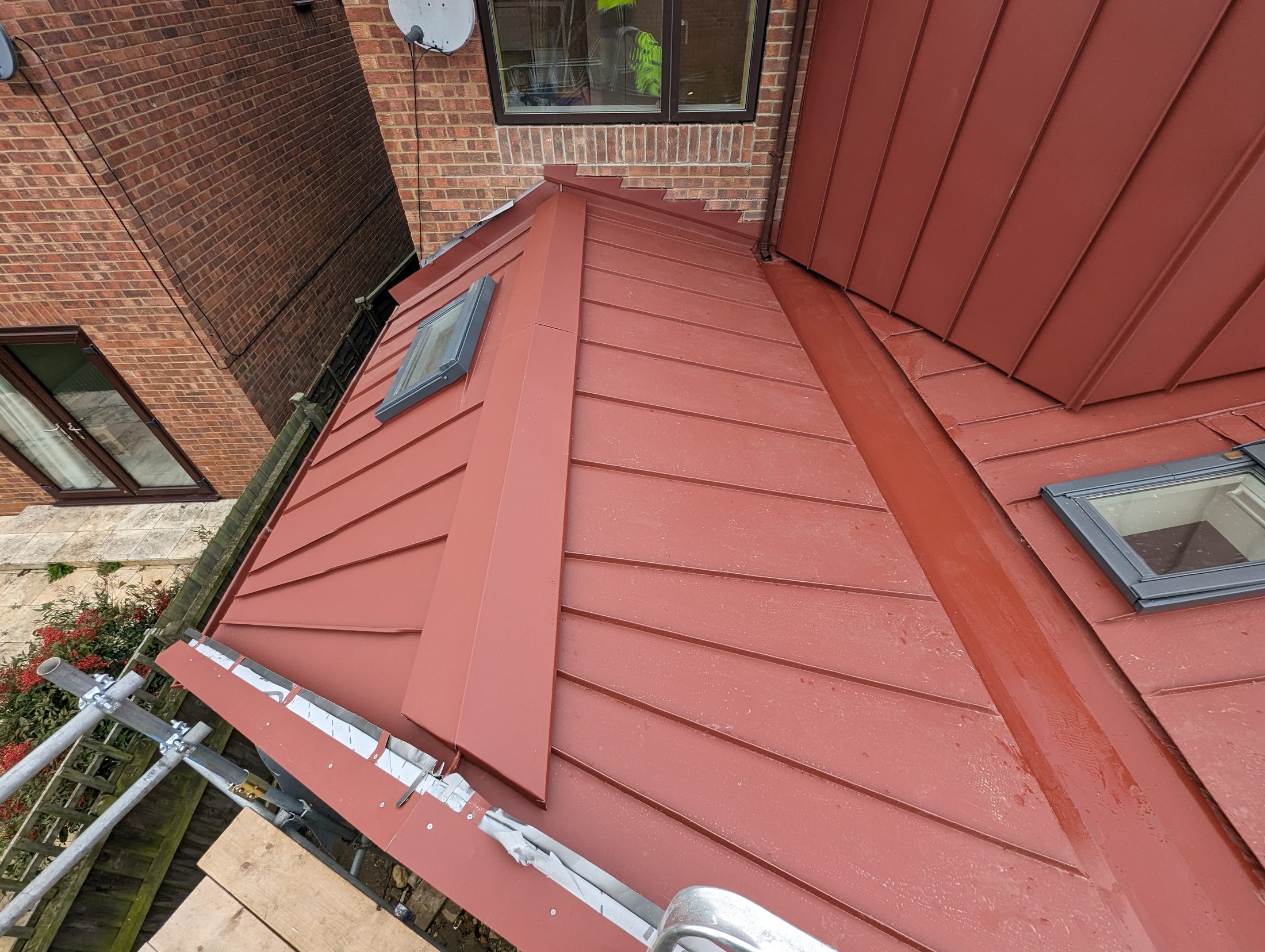 Red PREFA extension project photograph 5